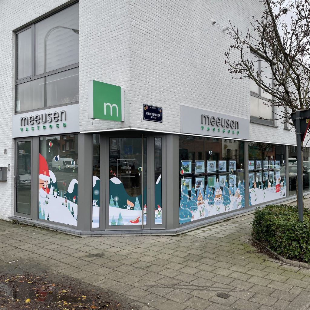 meeusen vastgoed raam belettering kerst